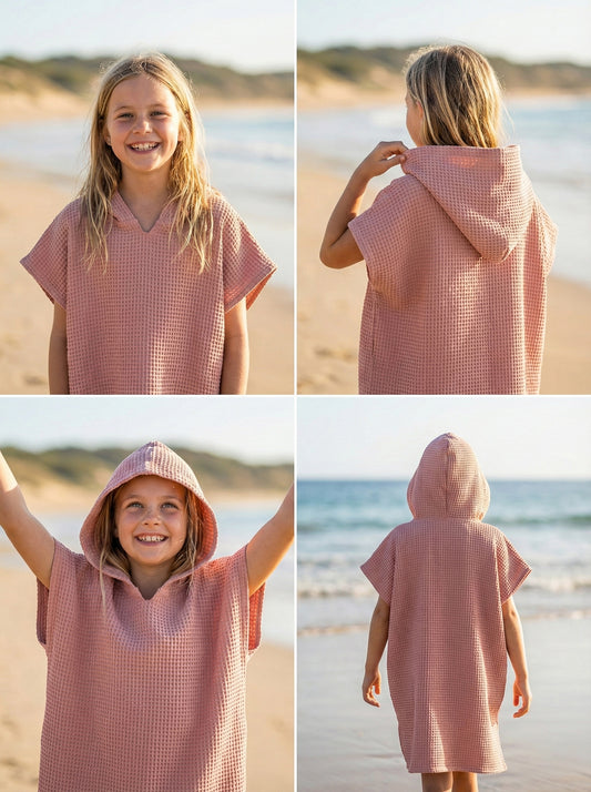 9yo wearing a wafflefish hooded towel